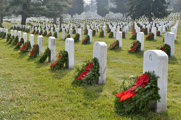 Arlington National Cemetery, Tombstones with Christmas Wreaths, Washington, DC, USA.