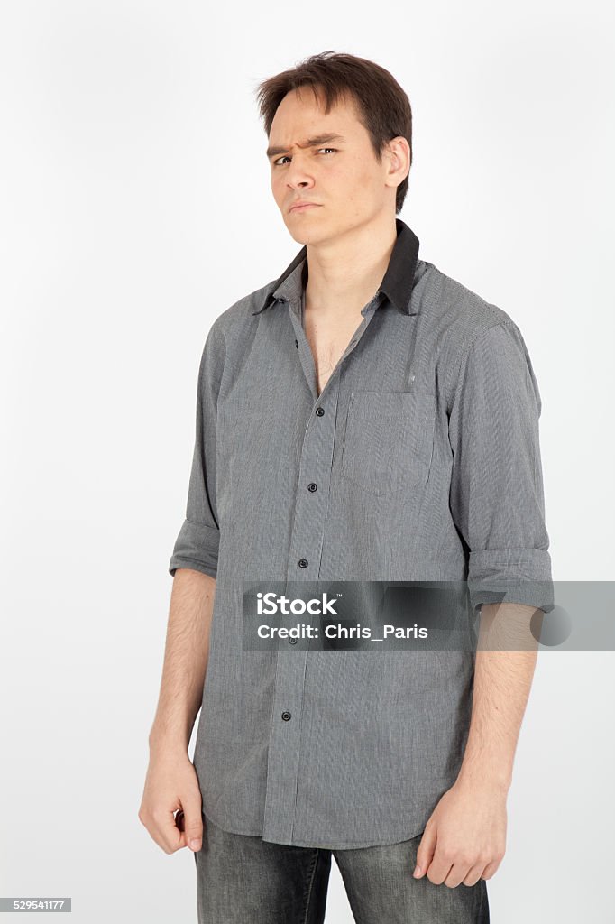 handsome man doing different expressions in different sets of clothes handsome man doing different expressions in different sets of clothes: angry Anger Stock Photo