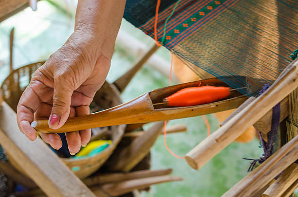 istock Woman weaving the cotton 529541575