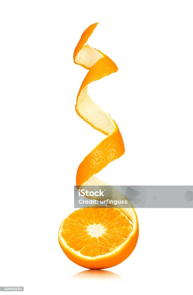 juicy orange with peeled spiral skin isolated on white Orange - Fruit Stock Photo
