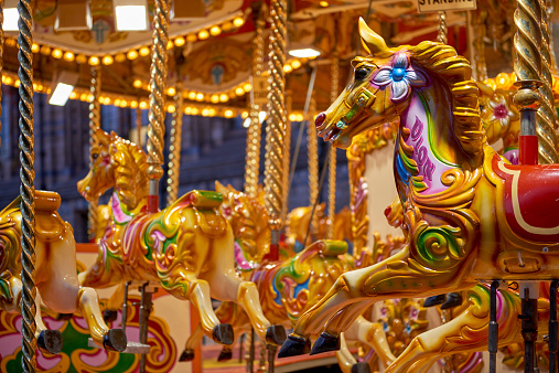 Detail of traditional Victorian carousel in the courtyard of the Natural History Museum. December 11, 2014 in London.