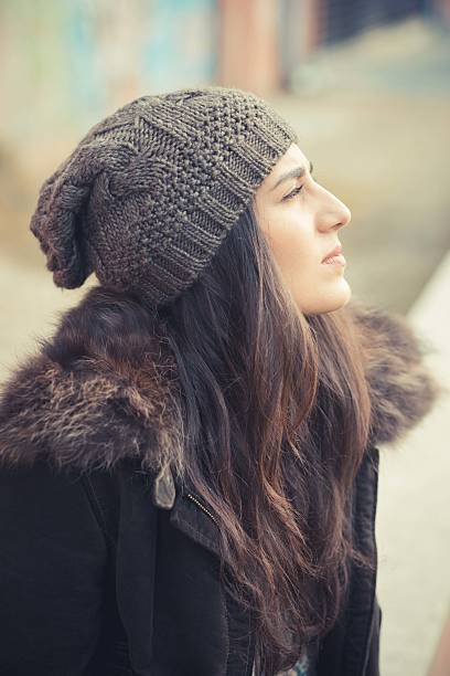 young beautiful brunette woman in the city