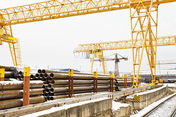 istock bridge cranes over railroad in outdoor warehouse 529544325