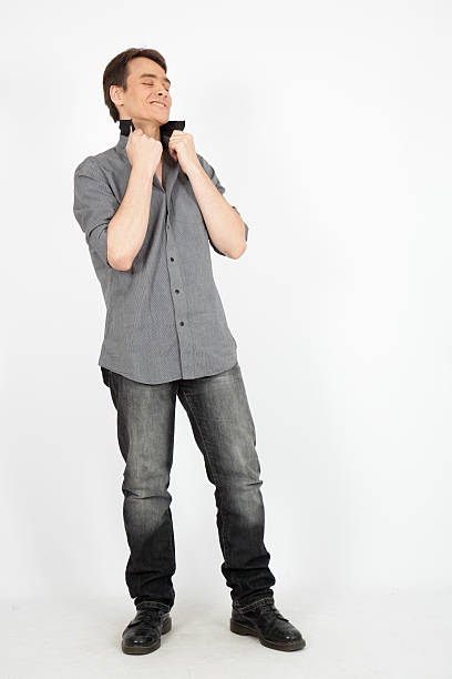 istock handsome man doing different expressions in different sets of clothes 529544961