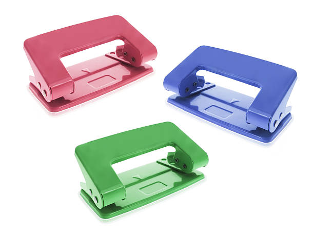Hole Punchers Stock Photo - Download Image Now - Cut Out, Hole Puncher,  Colors - iStock