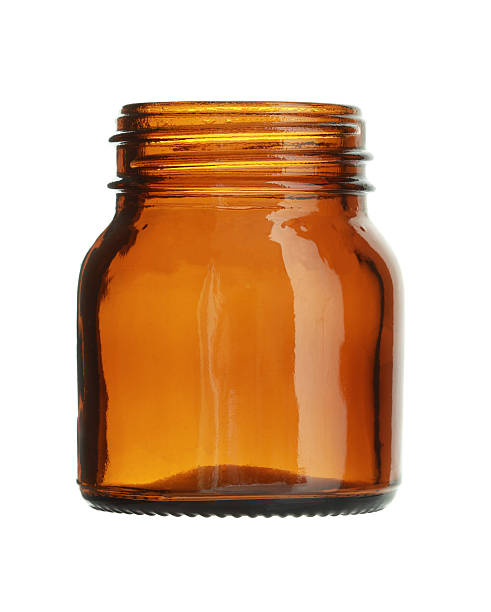 istock Short Brown Glass Bottle Wide Mouth isolated on white background 529555039