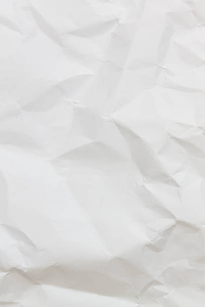 istock Close up crumpled white paper background 529555317