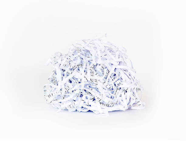istock Shredded paper ball on white background 529555559