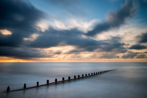 istock Beautiful long exposure vibrant concept image of ocean at sunset 529558081