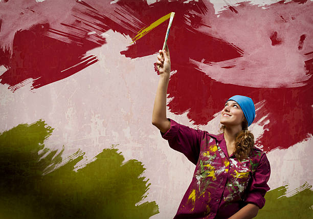 istock Woman with paintbrush 529558795
