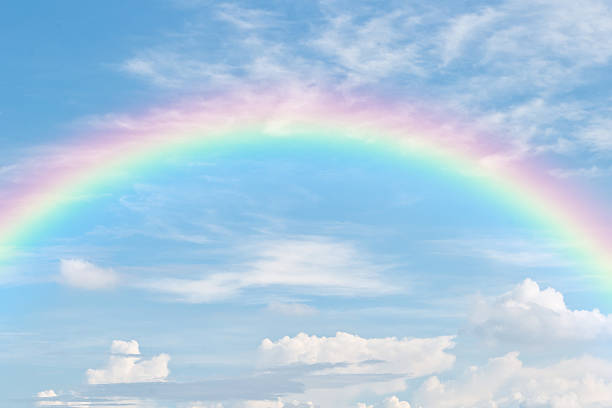 arco-íris no céu azul - lpn imagens e fotografias de stock