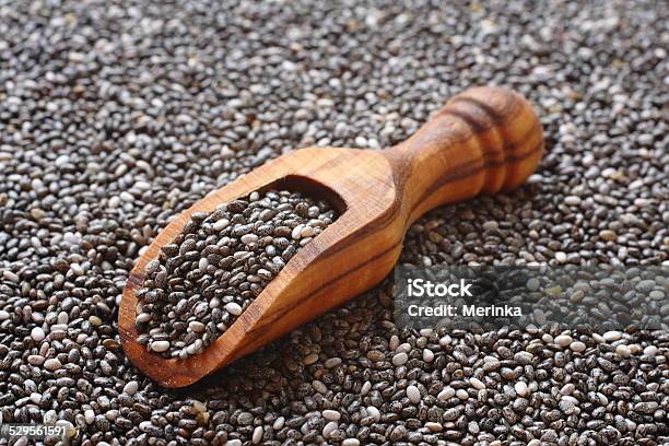 Chia Seeds In Wooden Scoops One Of The Superfoods Stock Photo - Download Image Now - Acid, Agriculture, Antioxidant