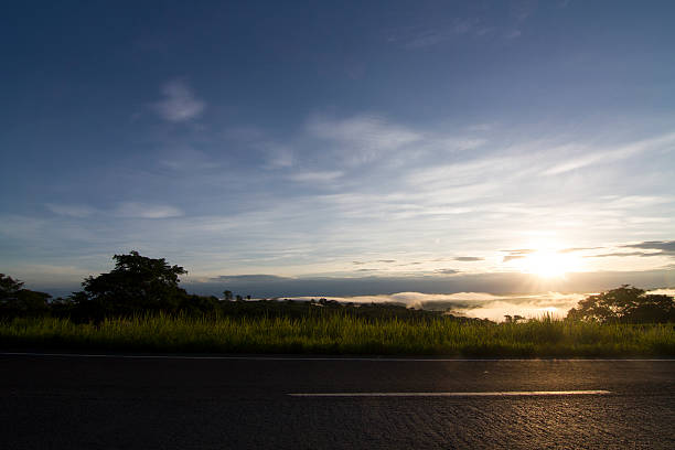 Sunrise on the road stock photo