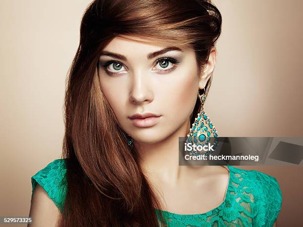 Portrait Of Beautiful Young Woman With Earring Stock Photo - Download Image Now - Adult, Adults Only, Arts Culture and Entertainment