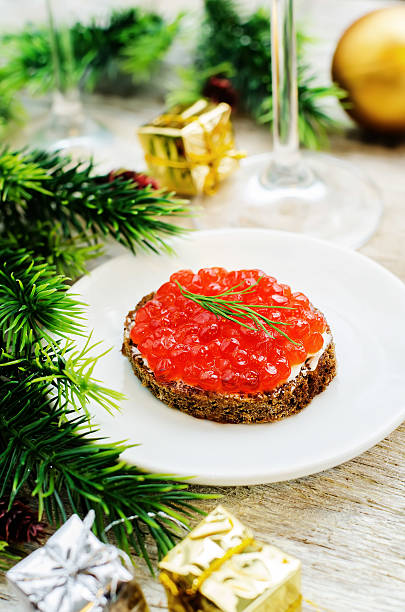 istock canape with red caviar and cream cheese 529573809