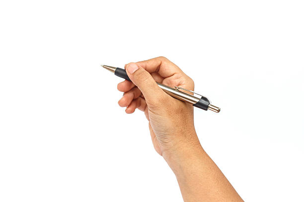 istock Hand holding pen isolated on white background 529573817