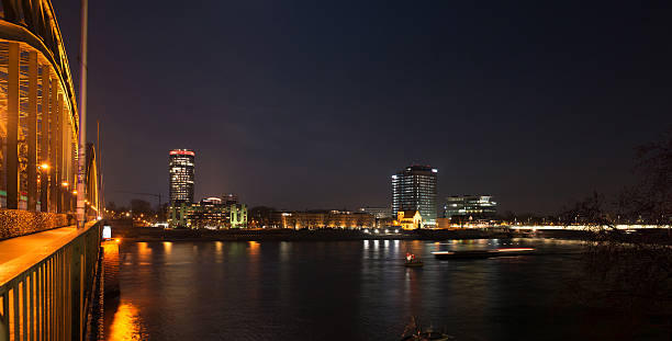 istock river rhine at night in Cologne, Germany 529574213