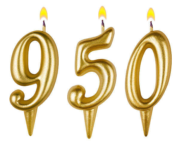 istock candles number nine hundred fifty isolated on white background 529576737