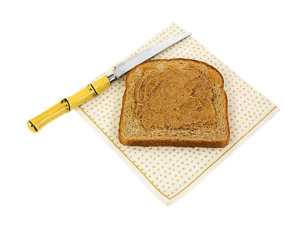 istock Almond butter wheat toast with knife 529576853