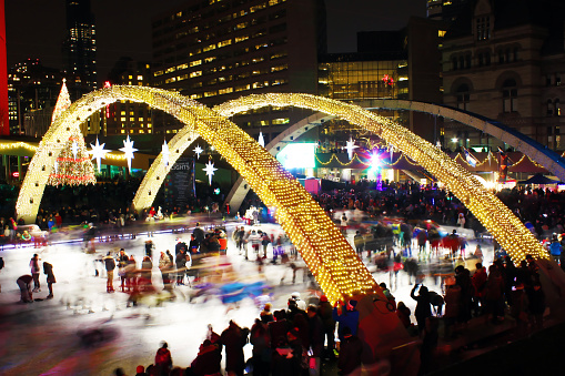 People ice-skating in Toronto's Nathan Phillips Square after the 47th Cavalcade of Lights. Cavalcade of Lights is an event that marks the official start of the holiday season.