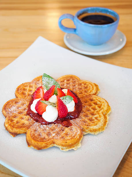 istock Waffle dessert woth coffee in cafe 529579155