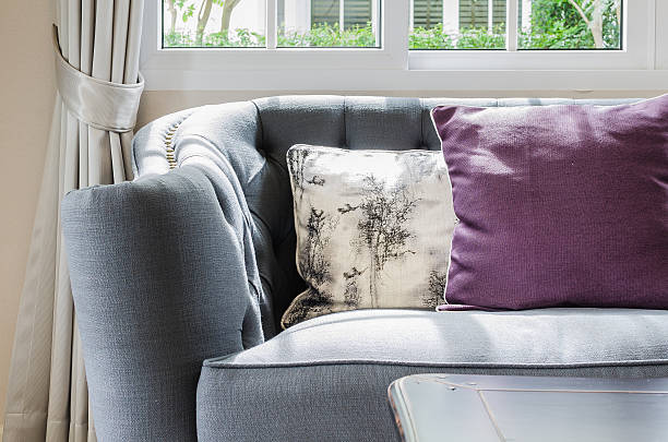 istock Luxury sofa in living room with pillows 529579987