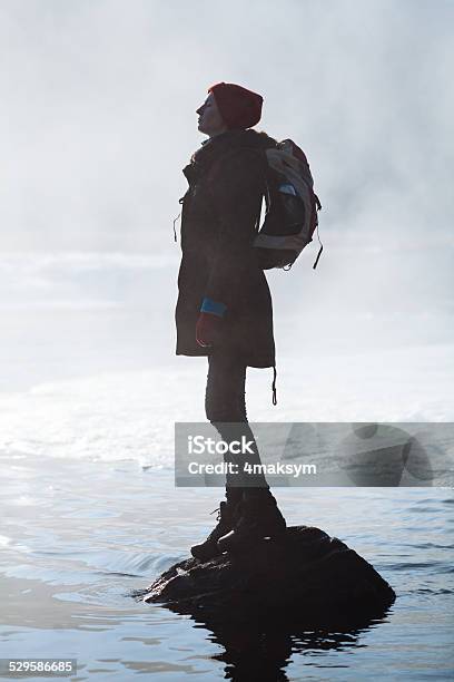 Girl Hiking In The Nature During Sunset Next To River Stock Photo - Download Image Now