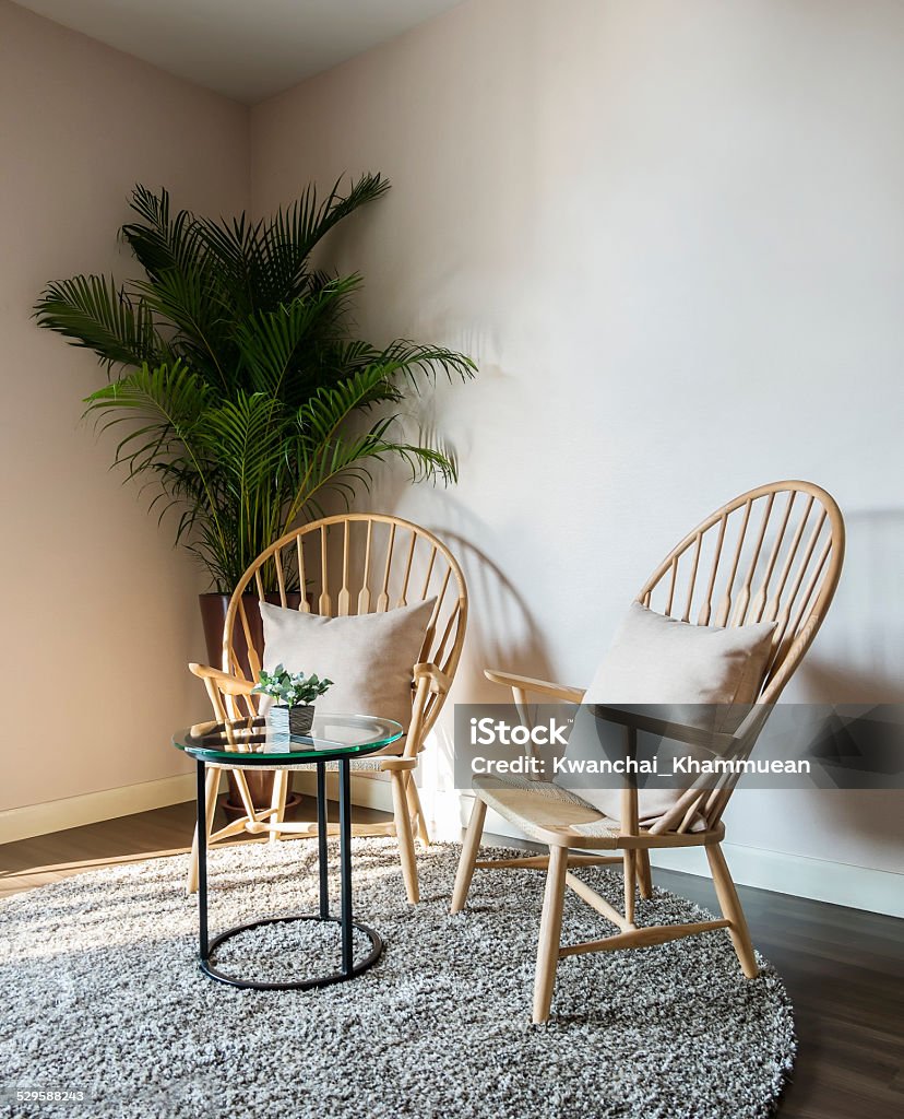 wood chair in living room Carpet - Decor Stock Photo