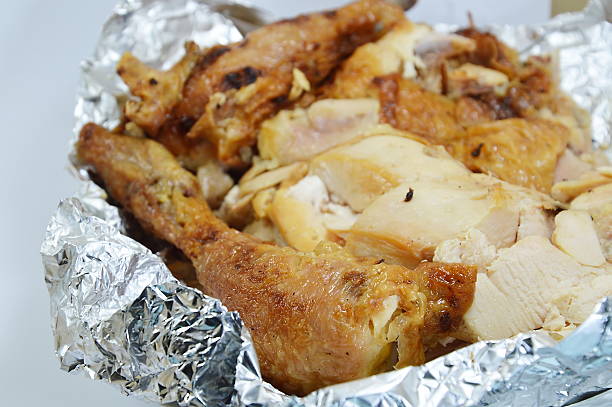 istock baked chicken on aluminium foil 529588847