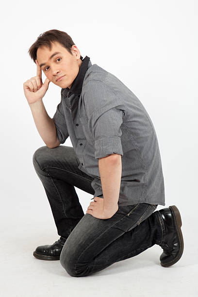 istock handsome man doing different expressions in different sets of clothes 529589393
