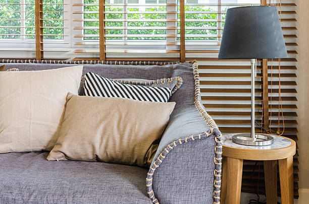 istock living room design with pillows on sofa and lamp 529590667