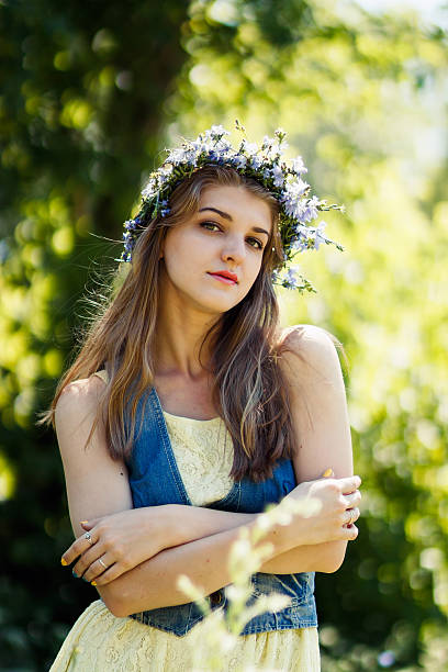 istock young woman in summer forest 529590685