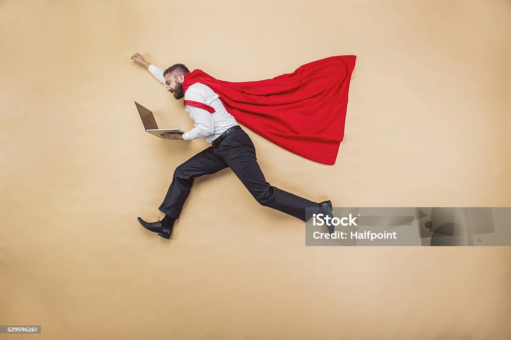 Super manager Manager with coat of superman. Superhero in studio. Superhero Stock Photo