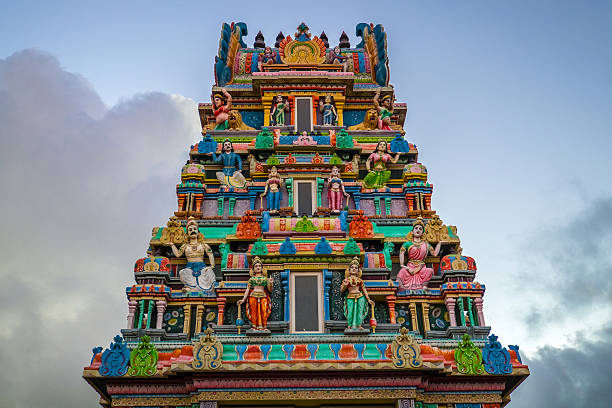 Victoria, Seychelles - January 4, 2020: Colorful Hindu temple with traditional statues in the city center of Victoria, Mahe island of Seychelles.