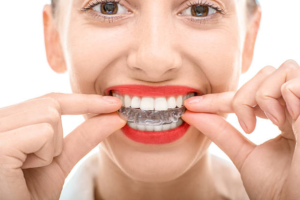 istock Wearing orthodontic silicone trainer 529600483