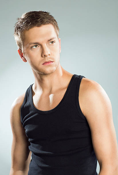 istock Handsome young man in black tank top 529601287