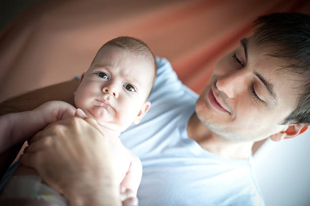 istock Happy young father with little baby 529601529