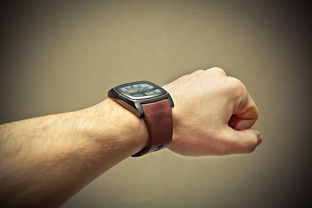 istock Brutal man's hand with a wristwatch 529603325