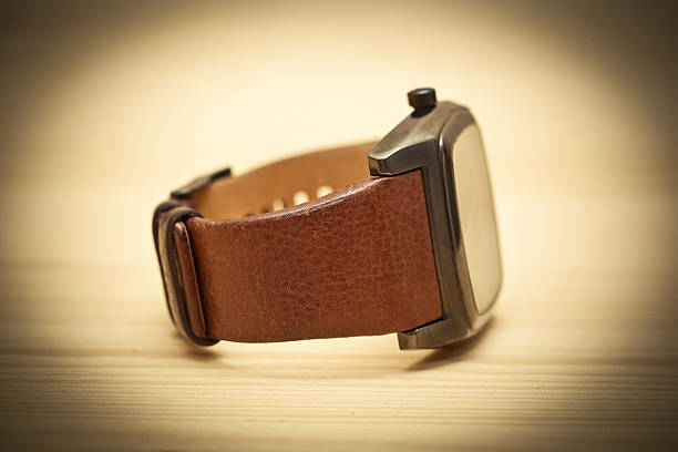 istock Wristwatch lie on the table 529646967