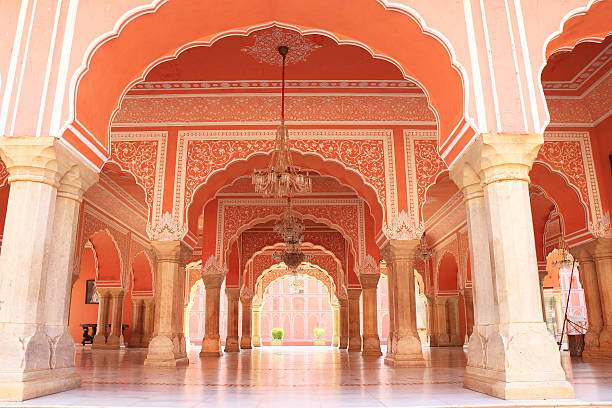 City Palace, Jaipur, rajasthan, india delightful arched building in Regal City Palace, Jaipur, containing Chandra Mahal and Mubarak Mahal palaces amid a huge complex, still used as a royal residence. built by Vidyadar Bhattachary for Maharaja of Jaipur in 1732,a prime example of Shilpa Shastra and Indian architecture with Rajput  Mughal and European styles of architecture. jaipur photos stock pictures, royalty-free photos & images
