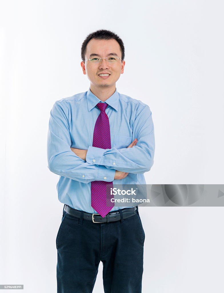 Young business man Young business man smiling with arms crossed against white background. 30-39 Years Stock Photo