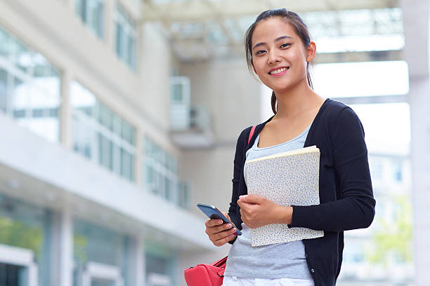 istock young asian woman smile at camera 529648723