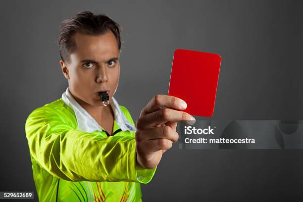 Soccer Referee Showing The Red Card Isolated On Gray Background Stock Photo - Download Image Now