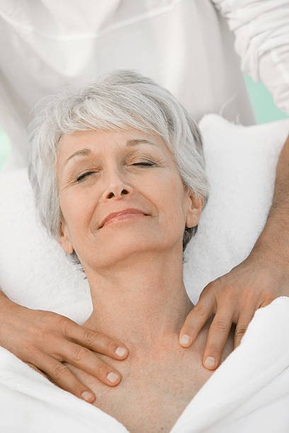 istock Senior woman having massage 529653137