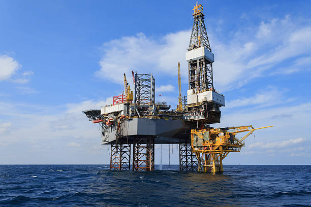 istock Offshore Jack Up Drilling Rig Over The Production Platform 529653307