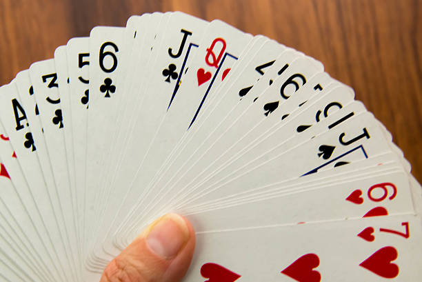 istock playing cards - full deck fanned out face up 529653579