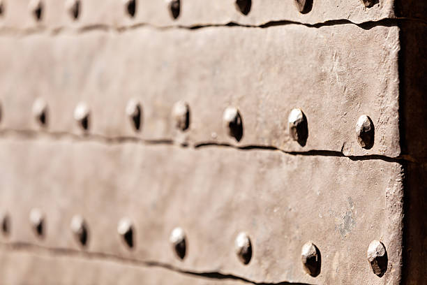 istock detail of medieval gate door 529654705