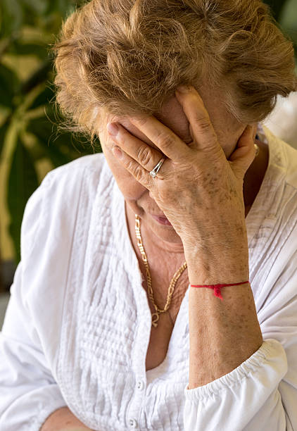istock desperate senior woman 529654891