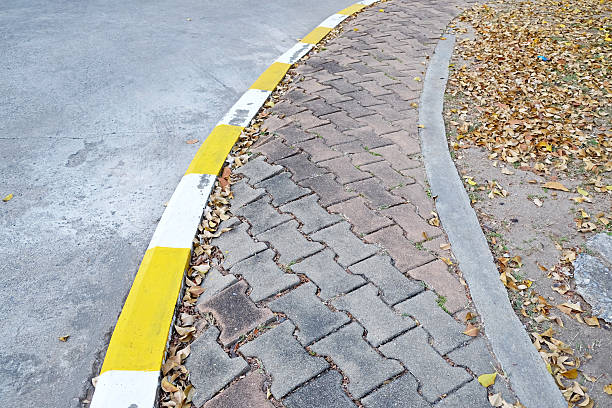 istock footpath pavement sidewalk with traffic sign 529657278