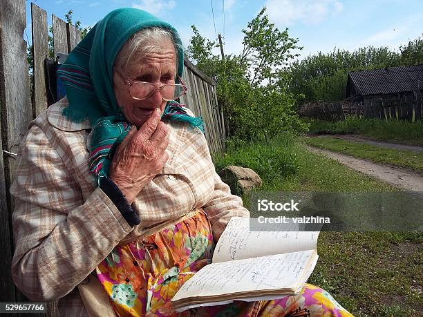 Old Woman Reading Stock Photo - Download Image Now - Active Seniors, Adult, Belarus